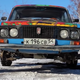 Illustration for article titled Man Puts 38-inch Off-Road Tires On a Russian Sedan Using Enormous Wheel Spacers, Rips Donuts